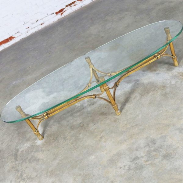 Mid Century Hollywood Regency Gilt Iron Base Coffee Table with Elliptical Glass Top