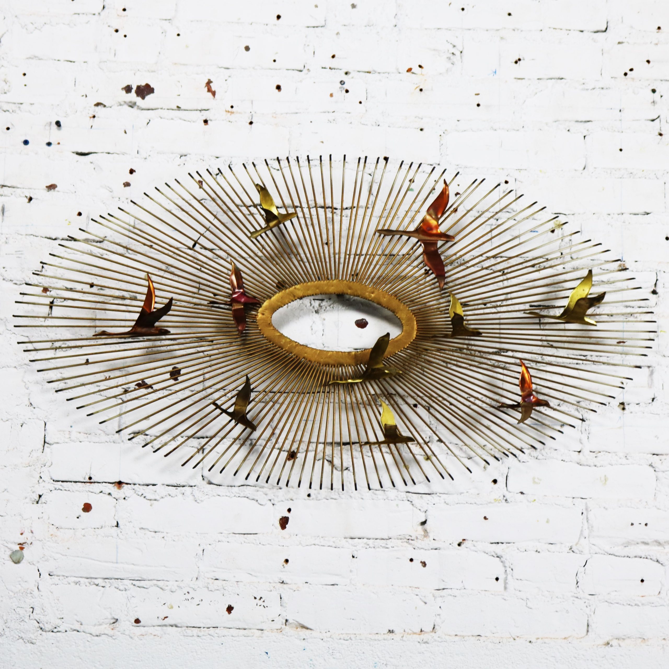 Mid Century Modern Oval Sunburst and Bird Wall Sculpture Attributed to C. Jere