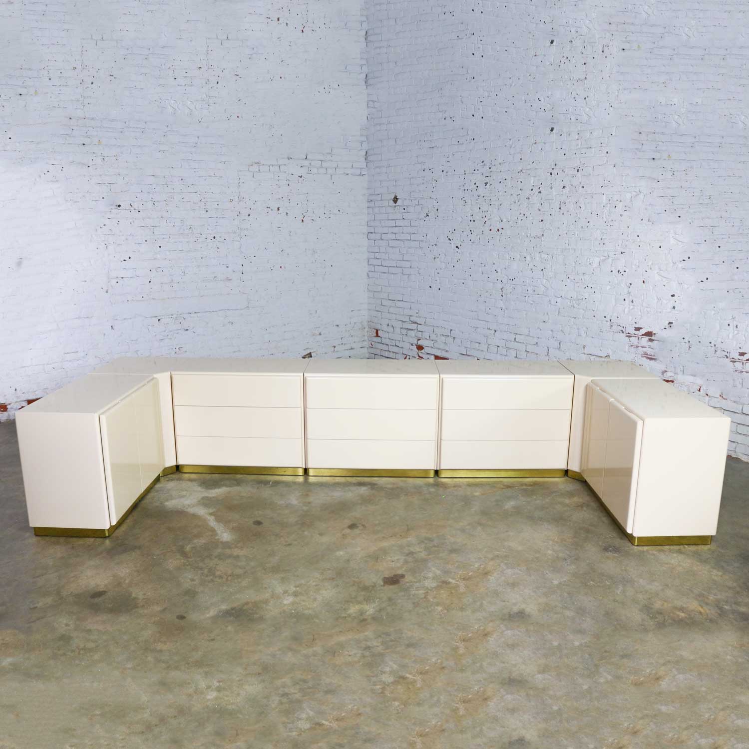 Milo Baughman for Thayer Coggin Ivory Lacquered Set of 7, 5 Cabinets & 2 Corner Units on Brass Bases
