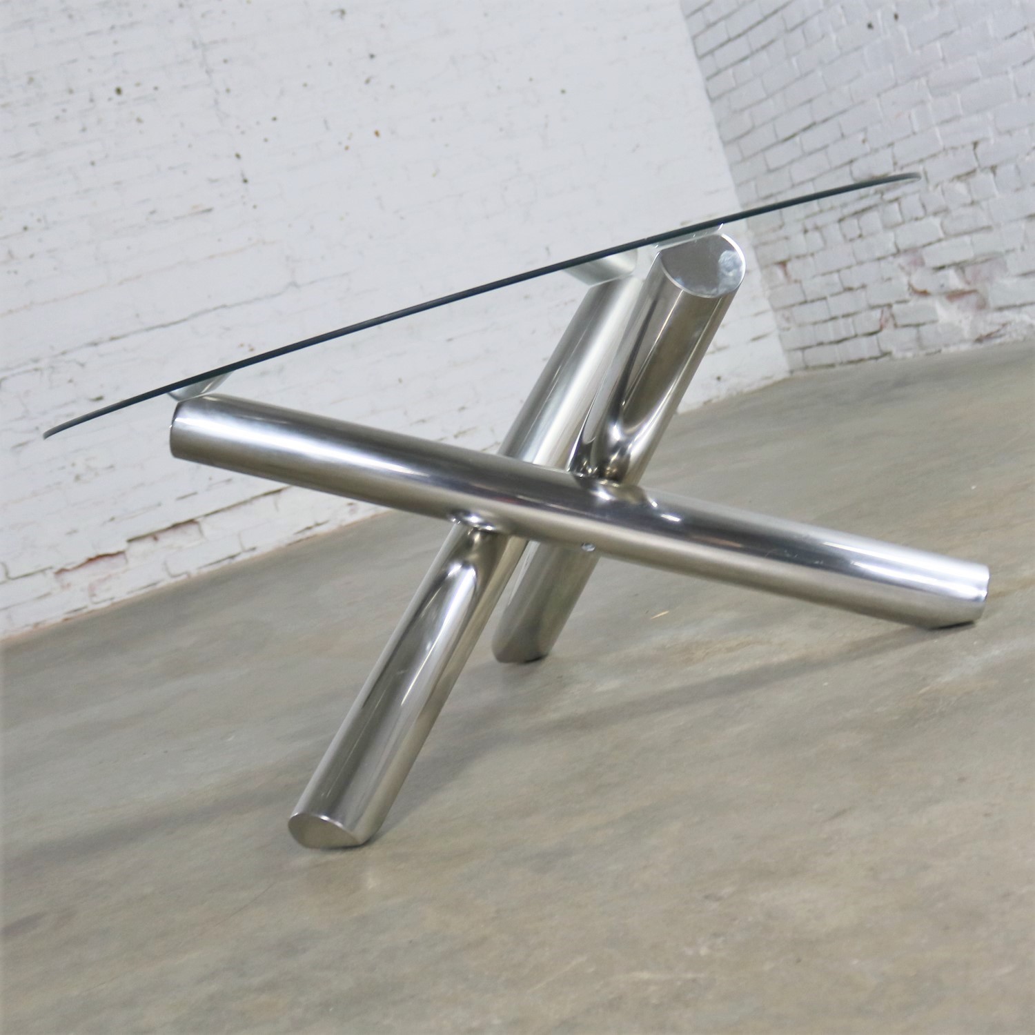 Tubular Stainless-Steel Jacks Tripod Coffee Table Round Glass Top Style of Milo Baughman