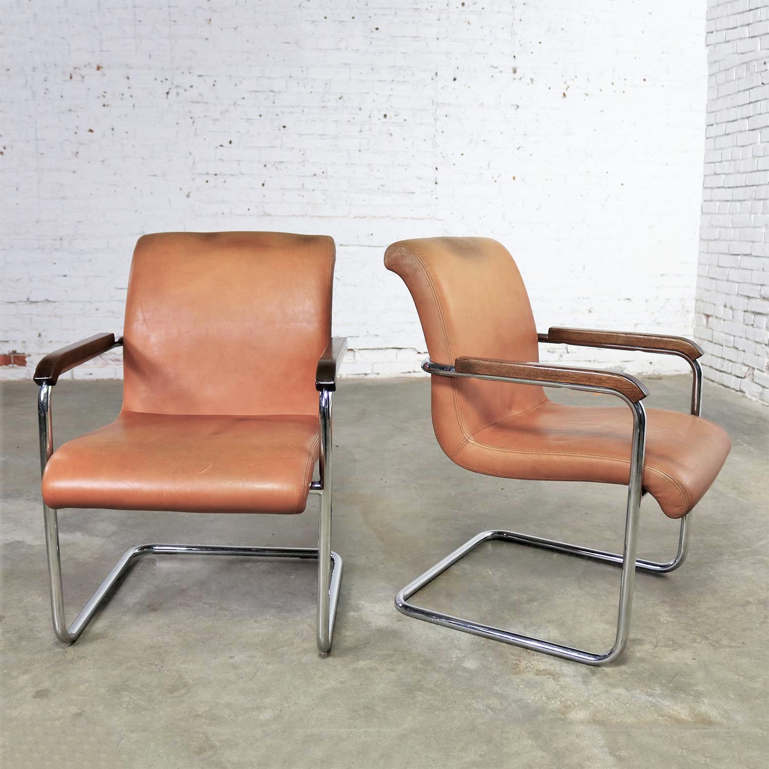 Interiors International Ltd. Cantilevered Chrome and Cognac Leather Chairs by John Geiger