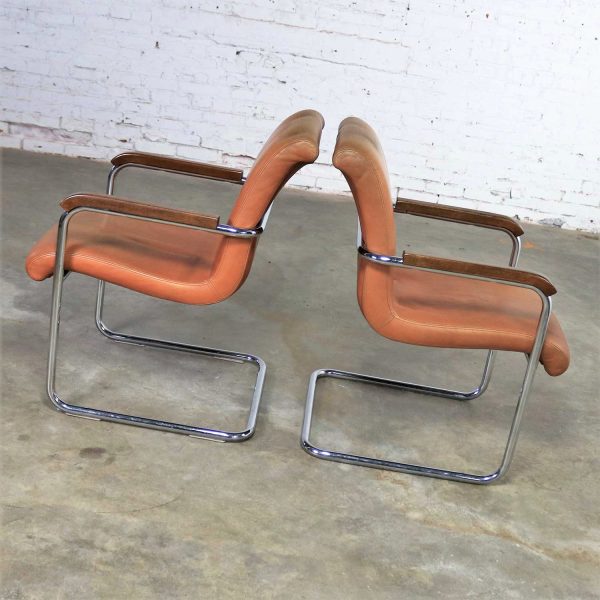 Interiors International Ltd. Cantilevered Chrome and Cognac Leather Chairs by John Geiger