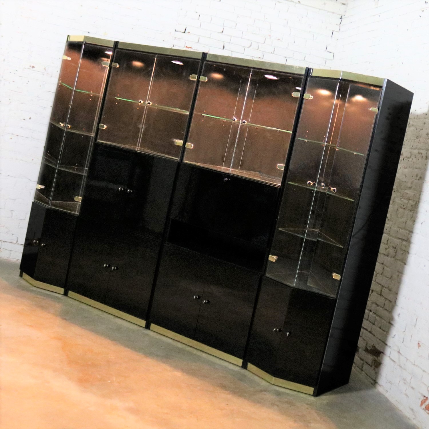 Italian Black Laminate Glass and Brass 4 Piece Modular Freestanding Wall Unit Display Cabinet