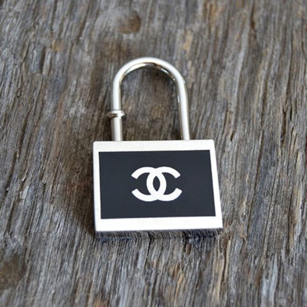 Chanel Black and Silvertone Padlock Keychain or Necklace Pe