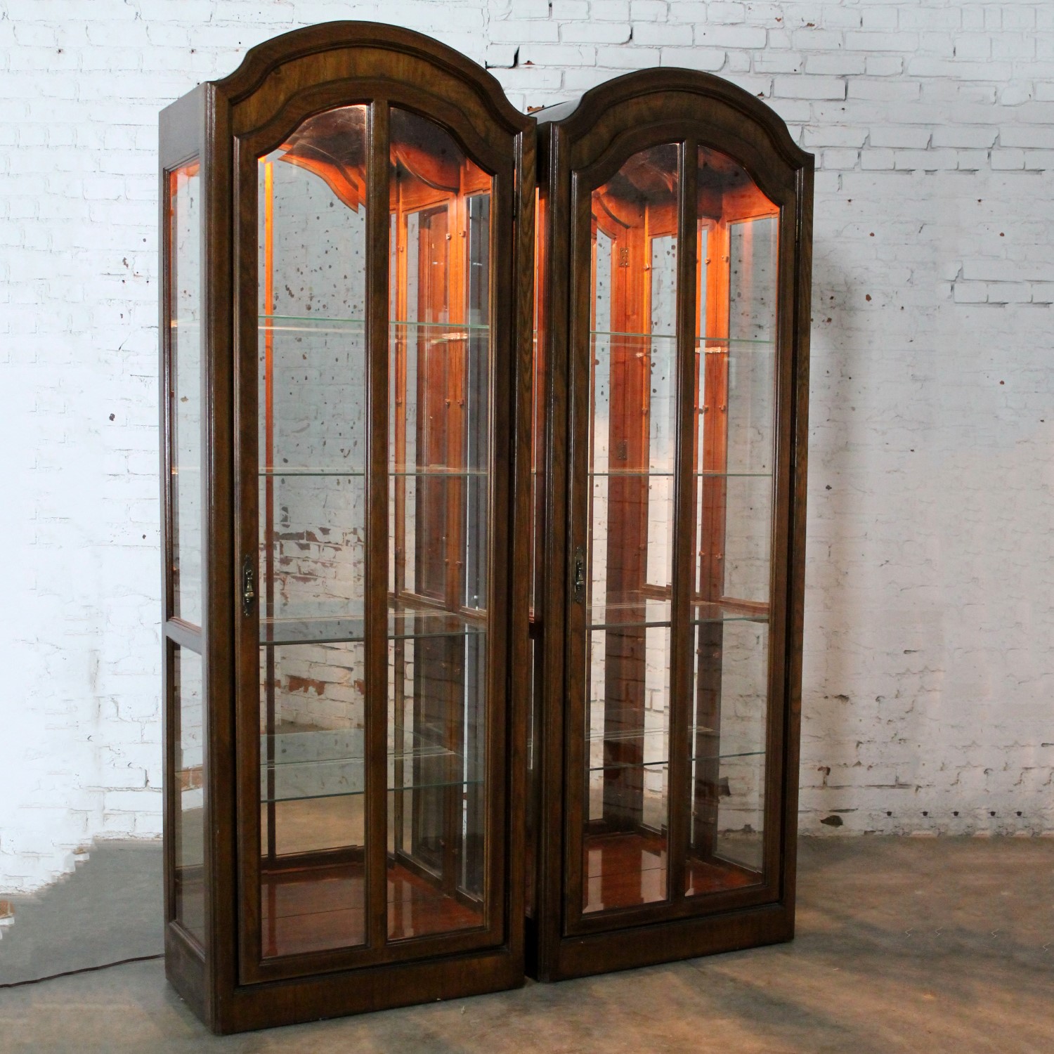Lighted Curio Cabinets with Arched Top in Dark Wood a Vintage Pair