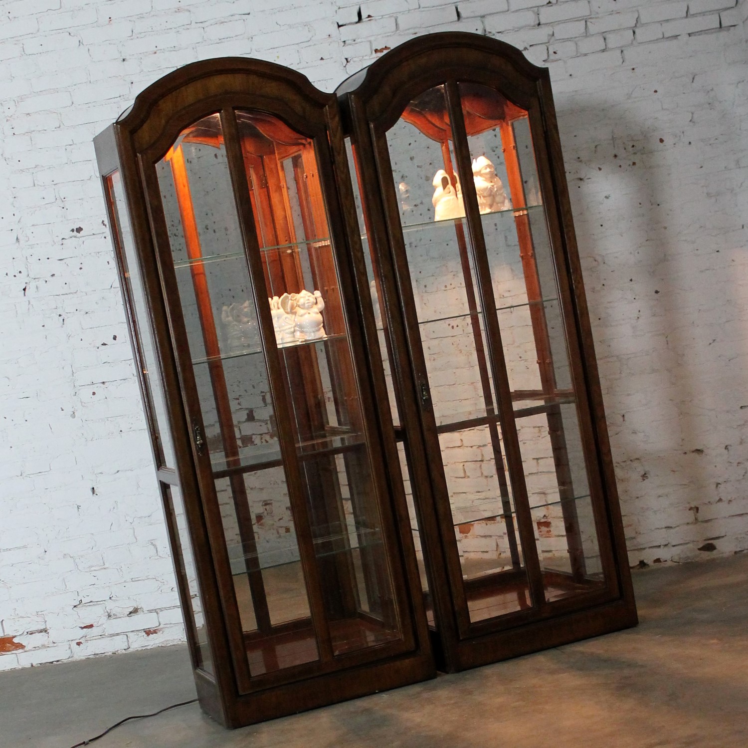 Lighted Curio Cabinets with Arched Top in Dark Wood a Vintage Pair
