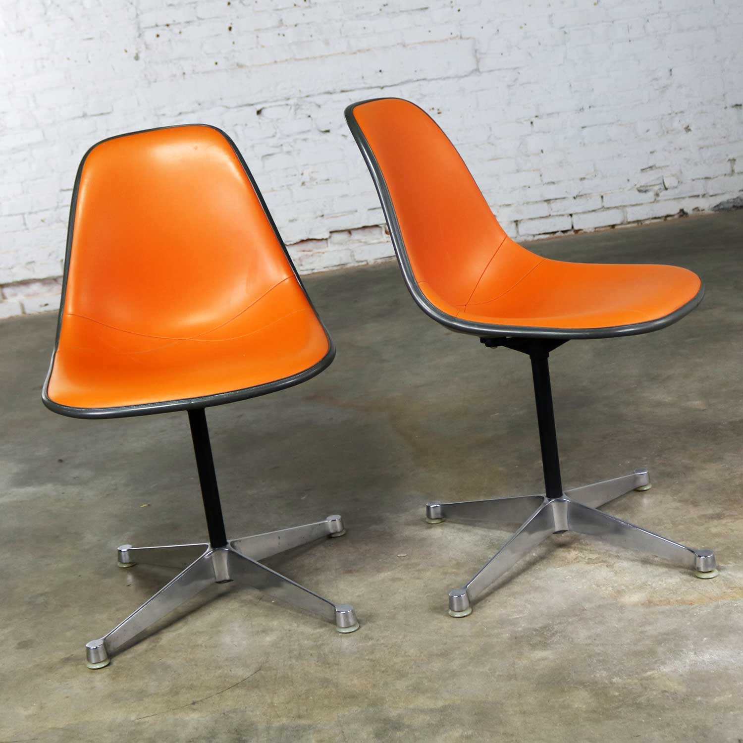 Eames PSC Orange Vinyl Upholstered Pivoting Side Shell Chair on Contract Base a Pair