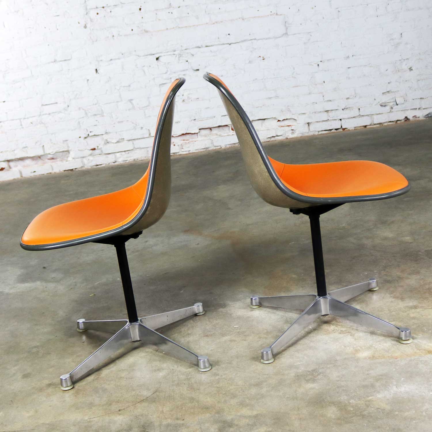 Eames PSC Orange Vinyl Upholstered Pivoting Side Shell Chair on Contract Base a Pair