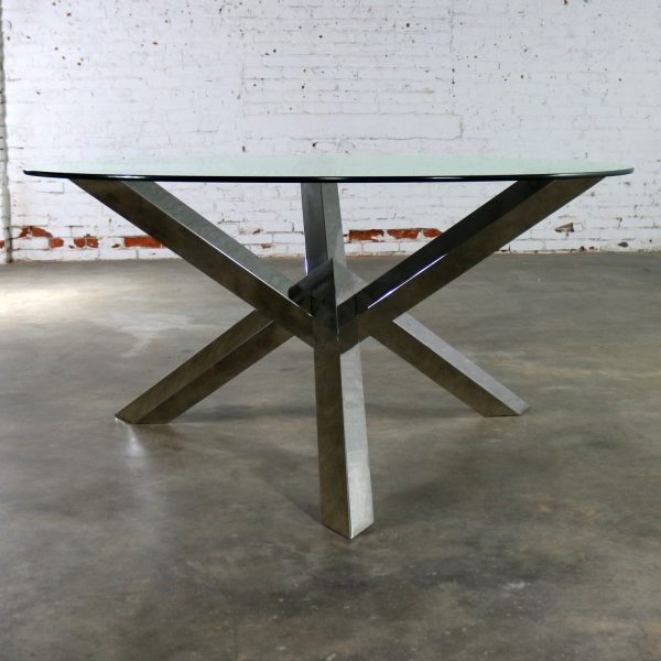 Nuevo Costa Round Stainless-Steel Jacks Style Dining Table with Glass Top