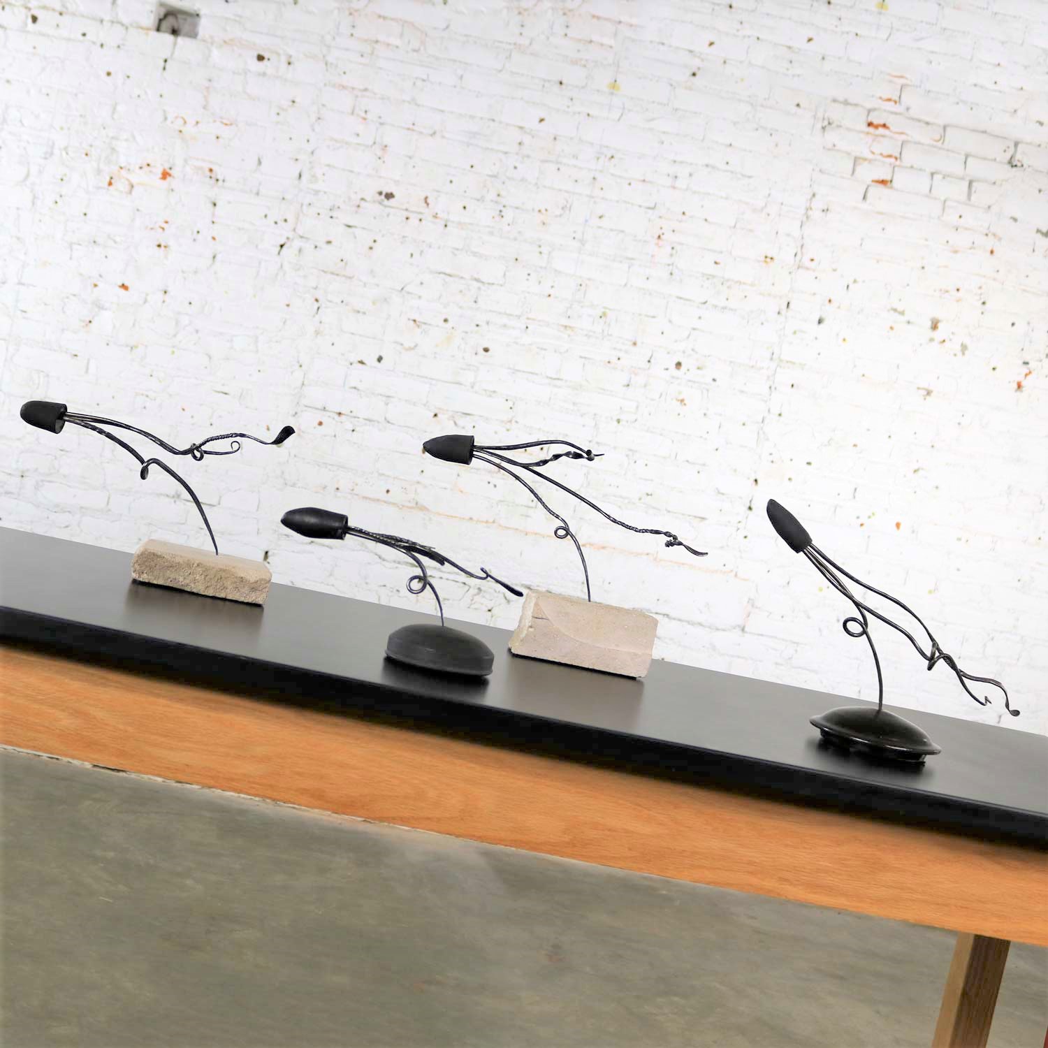 Loligo or Squid Metal Sculptures on Stone and Ceramic Bases by Larry Peters