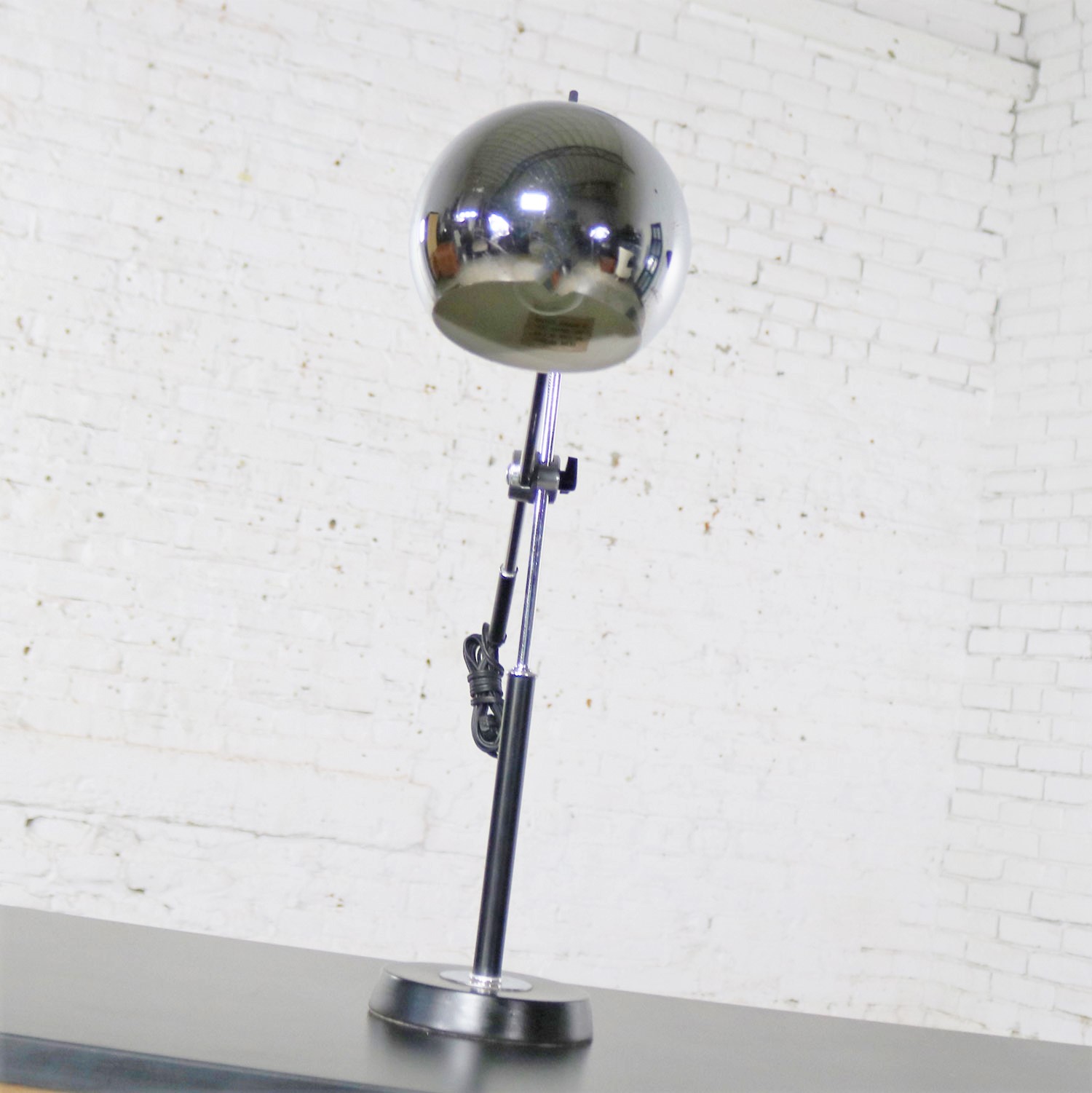 Articulating Chrome and Black Ball Orb Task Lamp Attributed to Robert Sonneman