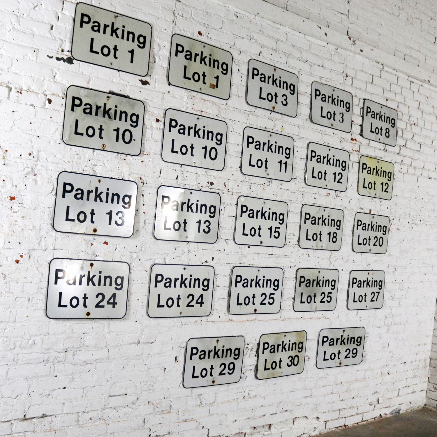 Twenty-Three Vintage Metal Parking Lot Number Signs