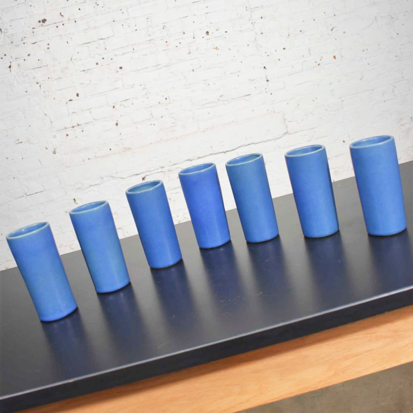 Van Briggle Pottery Dark Blue Cylindrical Tumblers Set of Seven or Vases