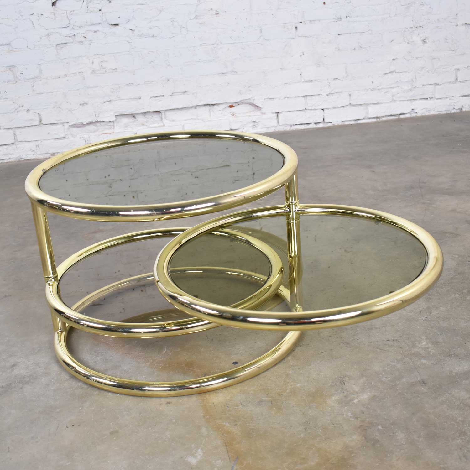 Modern Round Brass & Smoke Glass End Table or Coffee Table w/Pivoting Tiers Style of DIA Furniture 1970