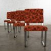 4 Streamline Modern Railroad Dining Car Chairs in Stainless Steel & Orange Abstract Upholstery