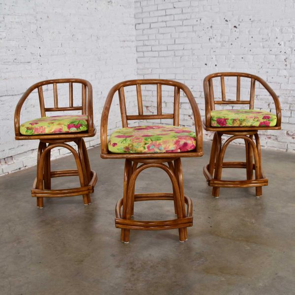 Three MCM Rattan Swivel Counter Height Bar Stools by Rattan Specialties, Inc.