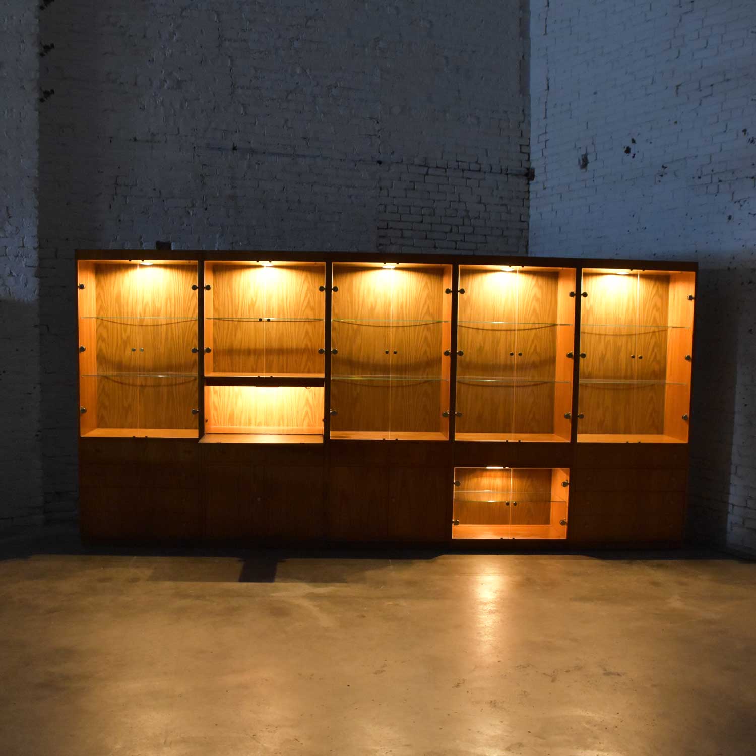 MCM Hooker 5 Section Oak Veneer Display Cabinet Wall Unit with Smoked Glass Doors and Brass Pulls