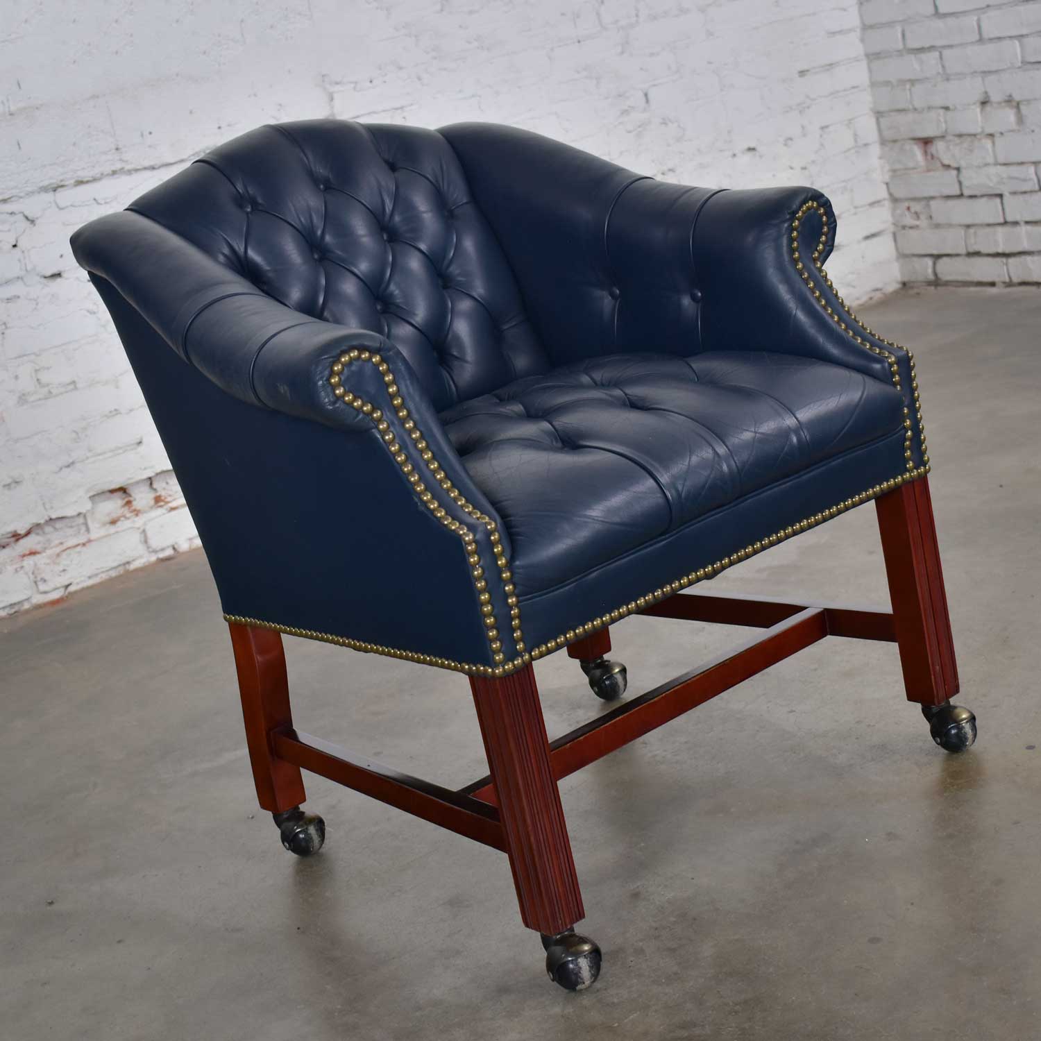 Vintage Blue Leather Rolling Captain’s Chair Campaign Chippendale Style