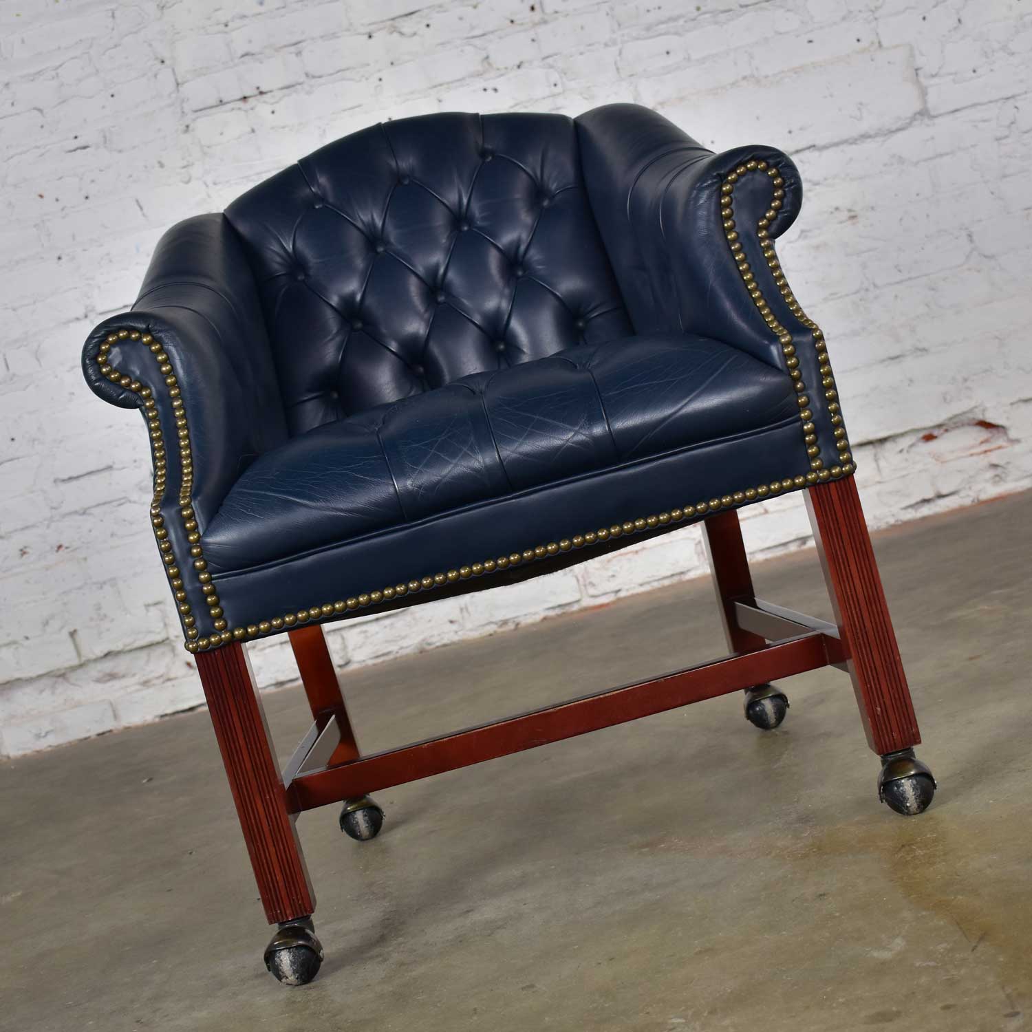 Vintage Blue Leather Rolling Captain’s Chair Campaign Chippendale Style