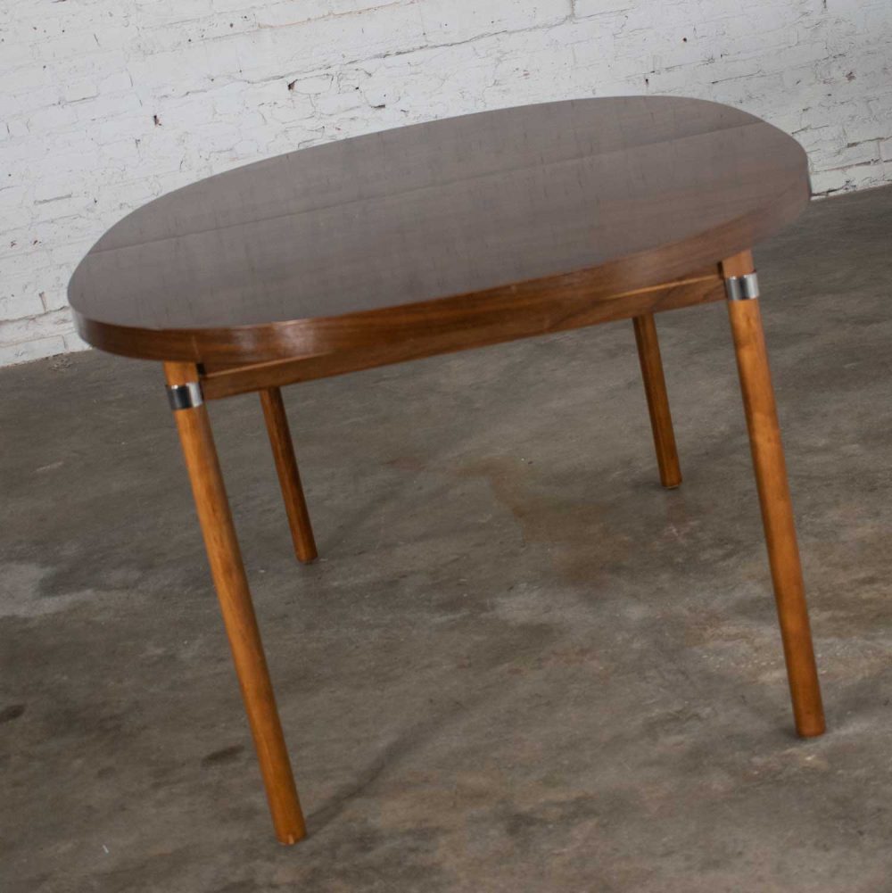 MCM Oval Walnut Toned Expanding Dining Table with Chrome Accents and Wood Grain Laminate Top