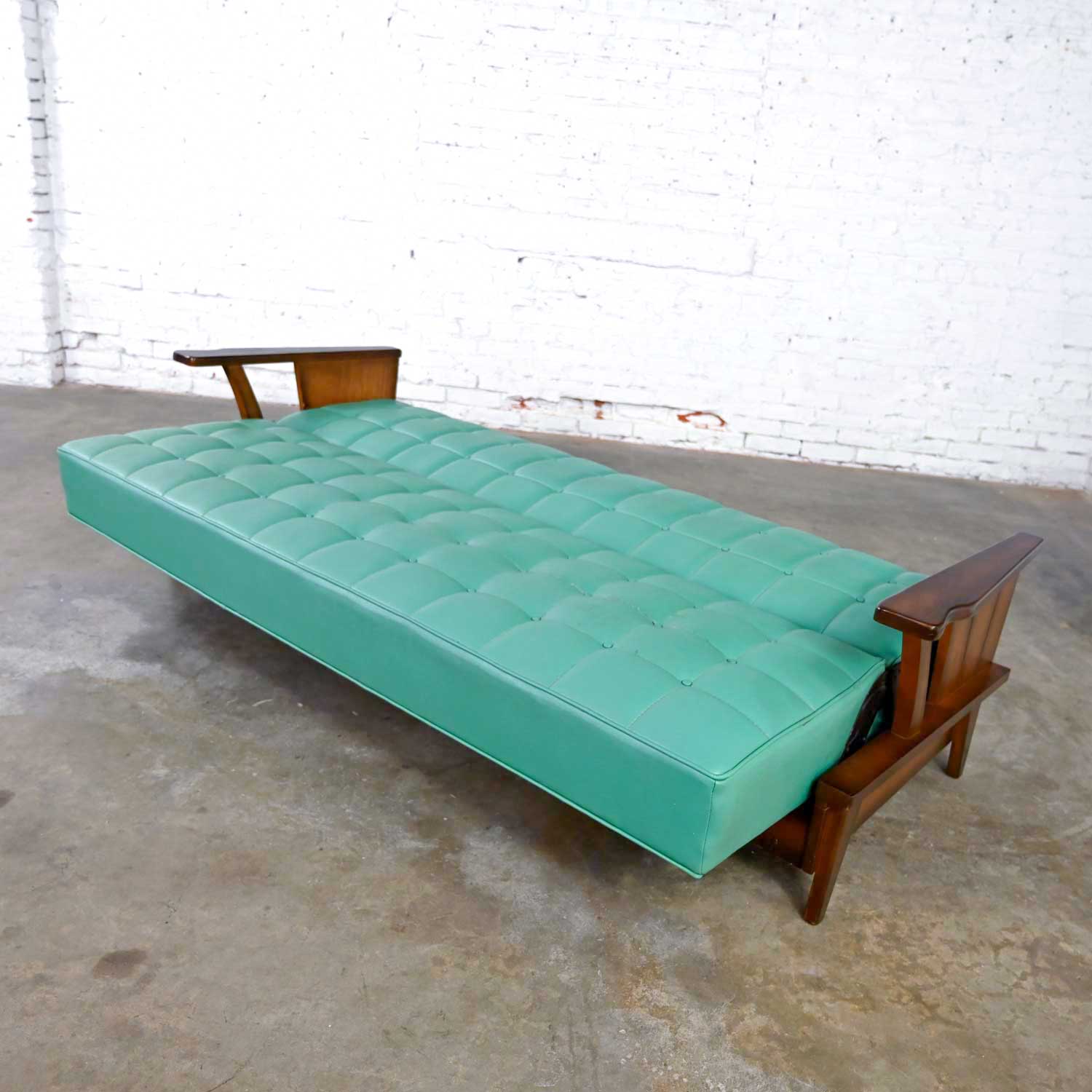 A Brandt Ranch Oak Style Turquoise Vinyl Convertible Sofa Daybed by Economy Furniture