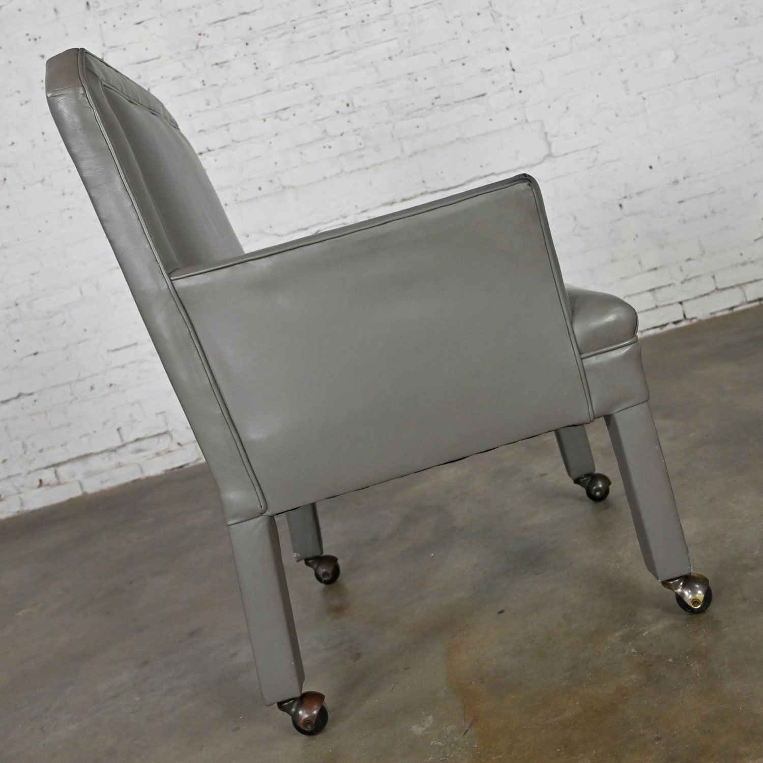 Modern Gray Faux Leather Modified Parson’s Style Armed Accent Chair on Casters