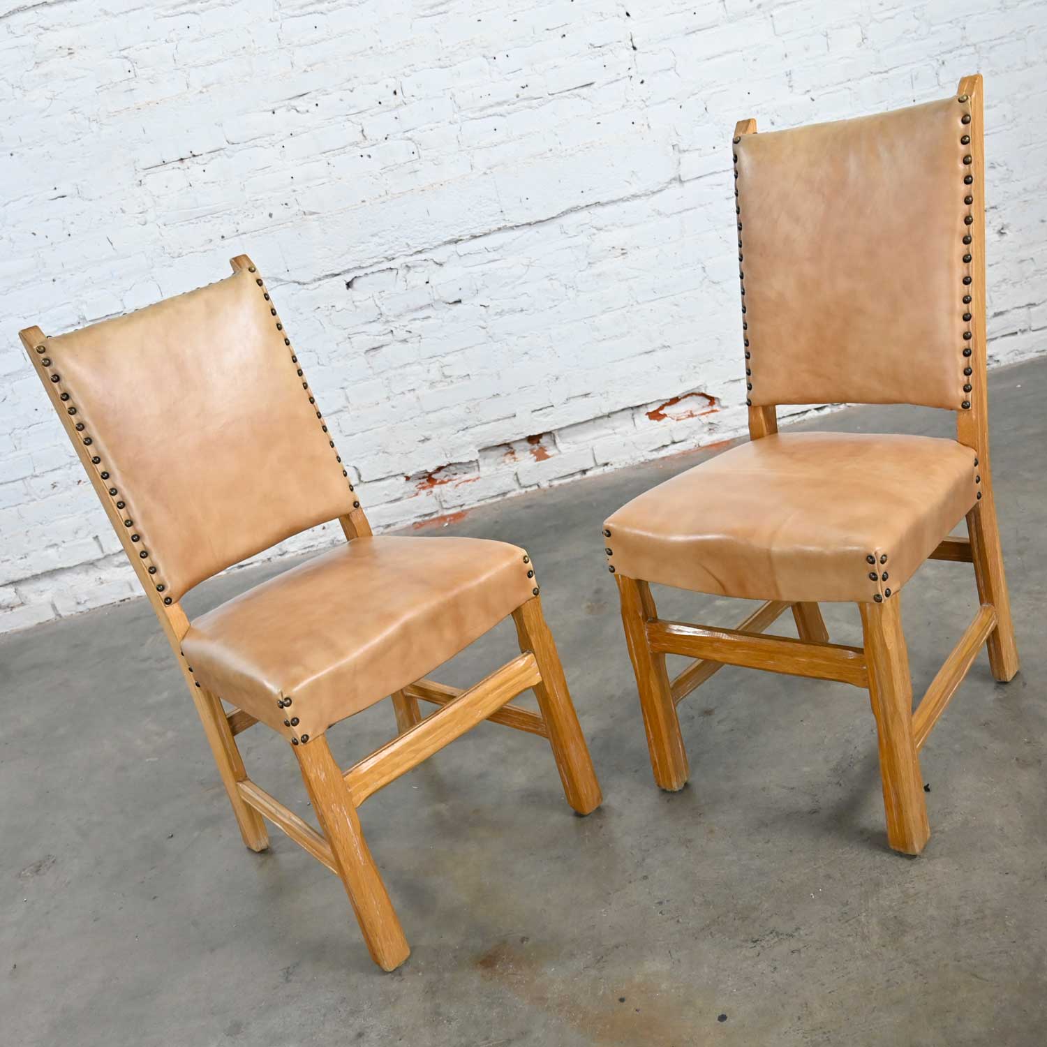Pair of Side Chairs Beige Vinyl & Antiqued Brass Nail Head Trim Attributed to A. Brandt Ranch Oak