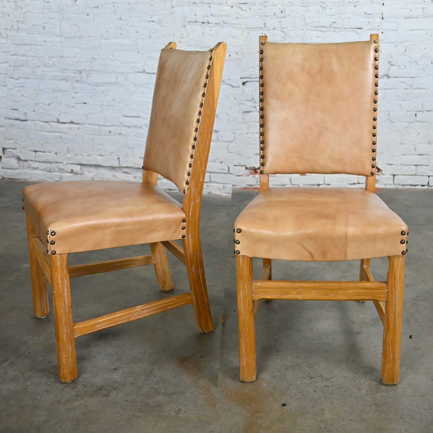 Pair of Side Chairs Beige Vinyl & Antiqued Brass Nail Head Trim Attributed to A. Brandt Ranch Oak