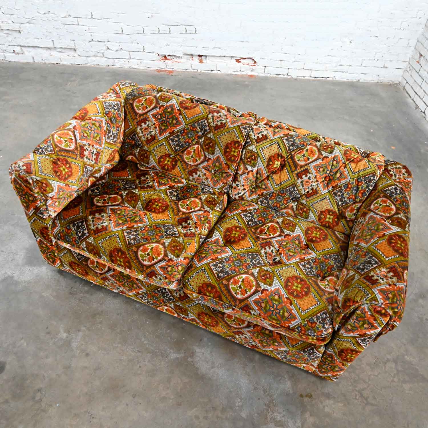 Vintage Modern Orange & Gold Geometrical Patterned Floral Patchwork Modern Tuxedo Style Love Seat by Maddox Furniture for J.C. Penney.
