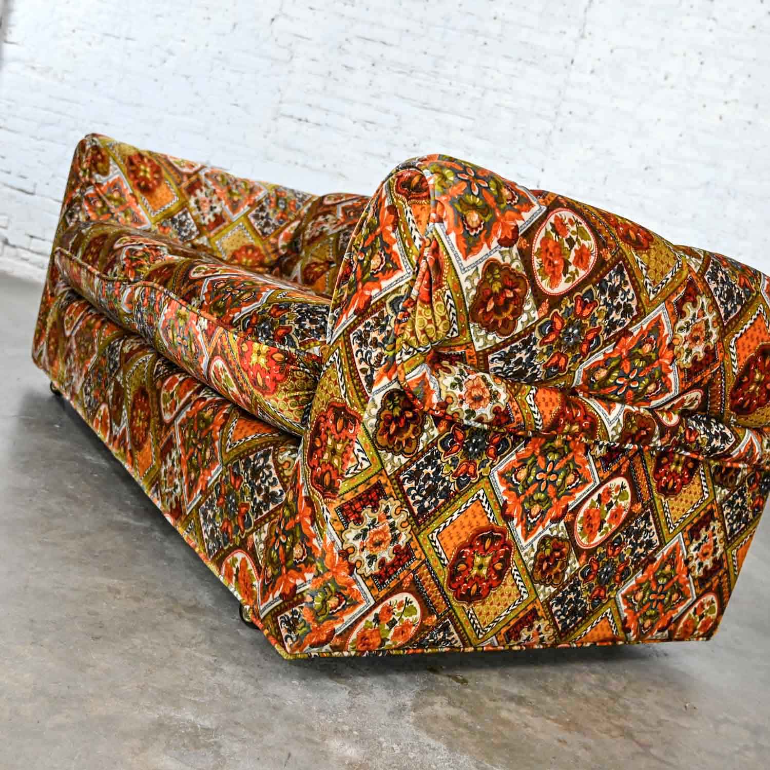 Vintage Modern Orange & Gold Geometrical Patterned Floral Patchwork Modern Tuxedo Style Love Seat by Maddox Furniture for J.C. Penney.