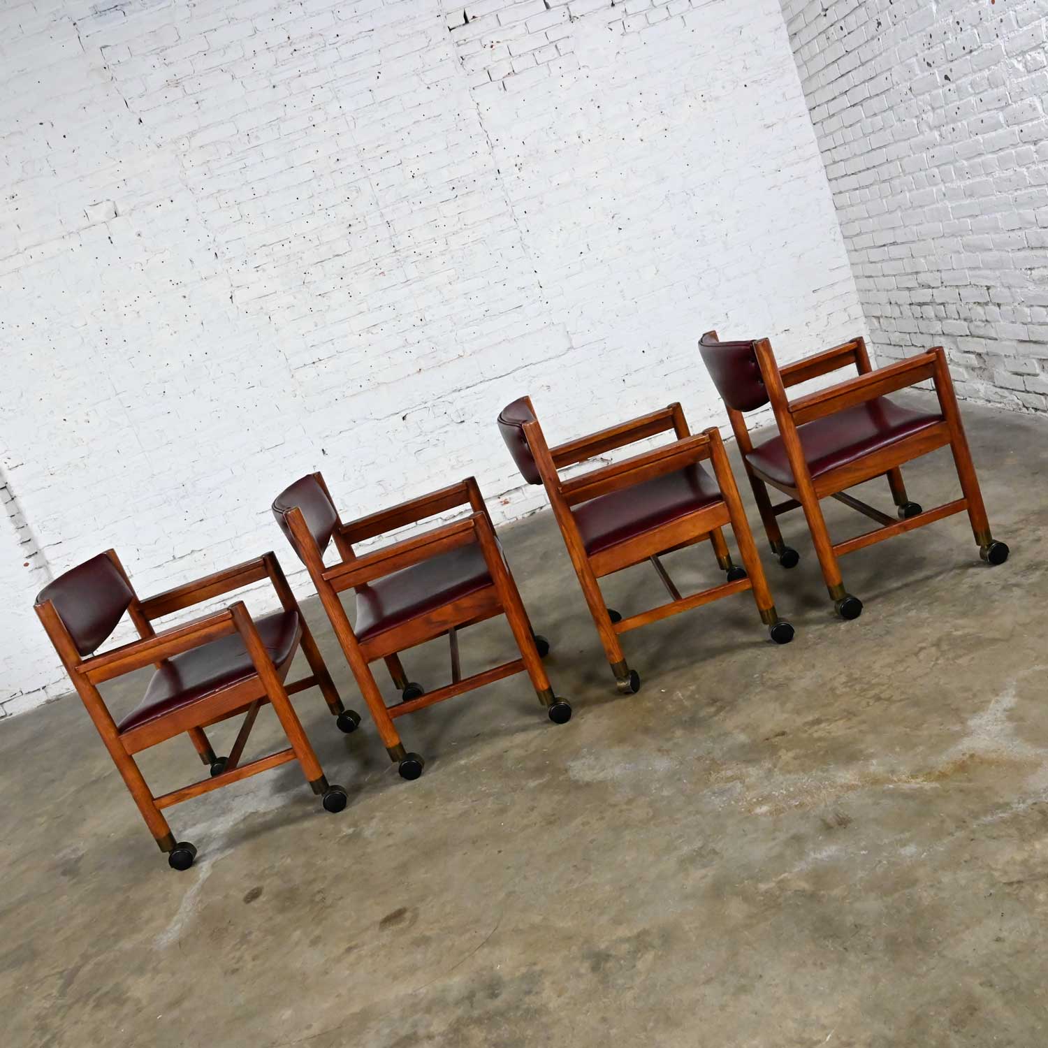 Mid-Century Modern to Modern Oak Maroon Vinyl Rolling Game or Dining Chairs
