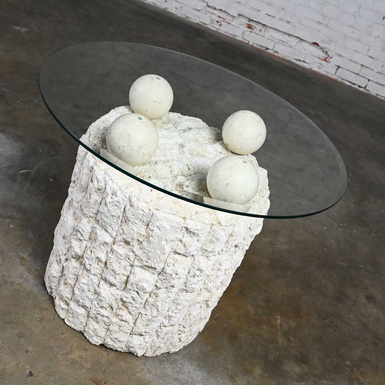 Postmodern Round Tessellated Mactan Stone Base Side Table with 4 Spheres Glass Top Style Maitland Smith