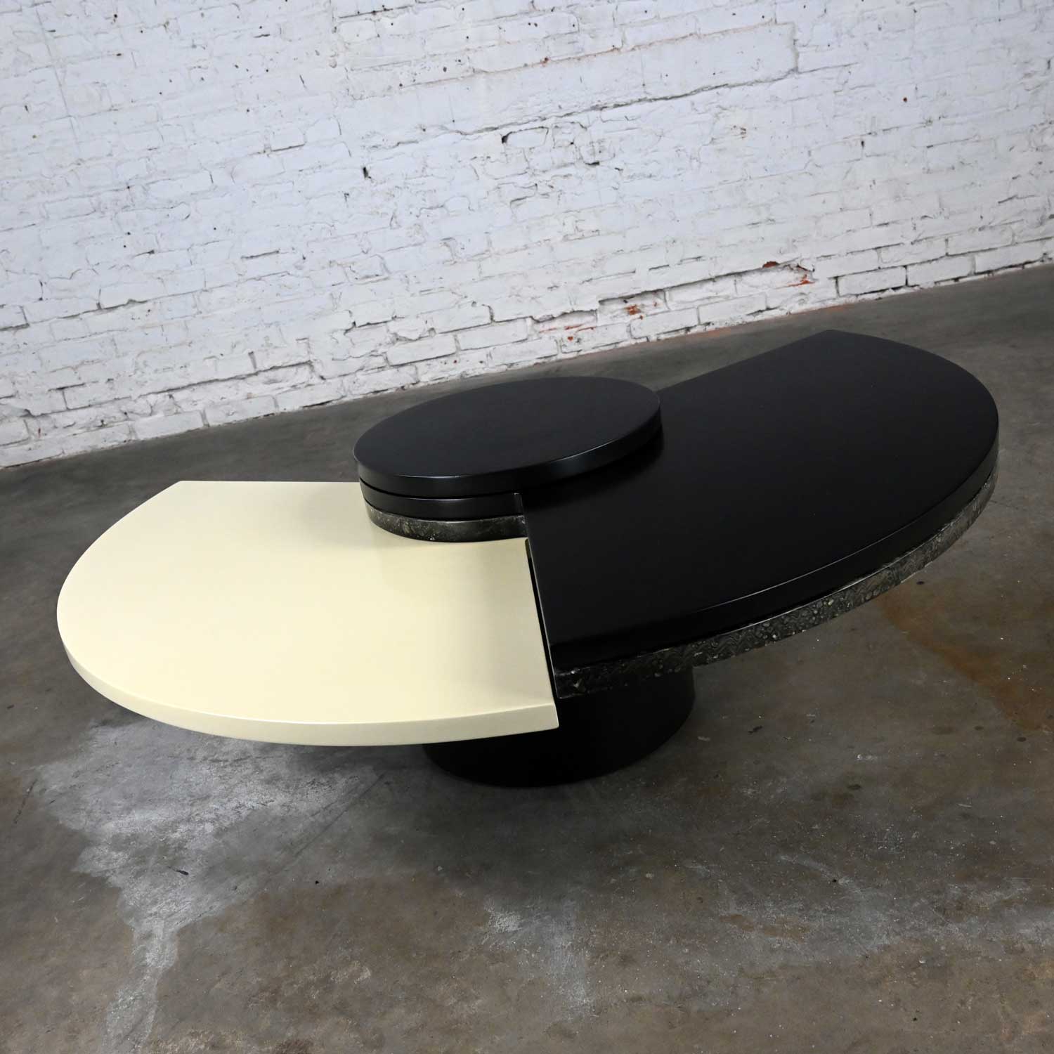 Postmodern Rotating Coffee Table with 3 Wedge Top Sections Black White & Faux Marble After Dakota Jackson Self Winding Coffee Table