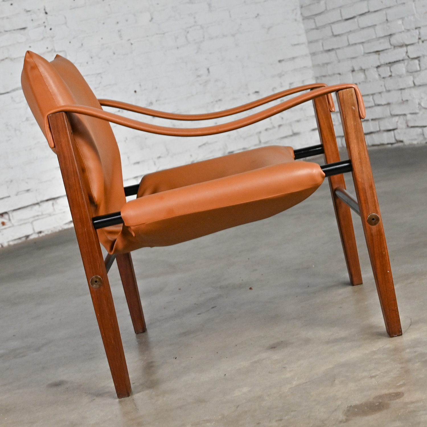 1960’s MCM Chelsea Safari Chair by Maurice Burke for Arkana Furniture Cognac Faux Leather Teak & Metal