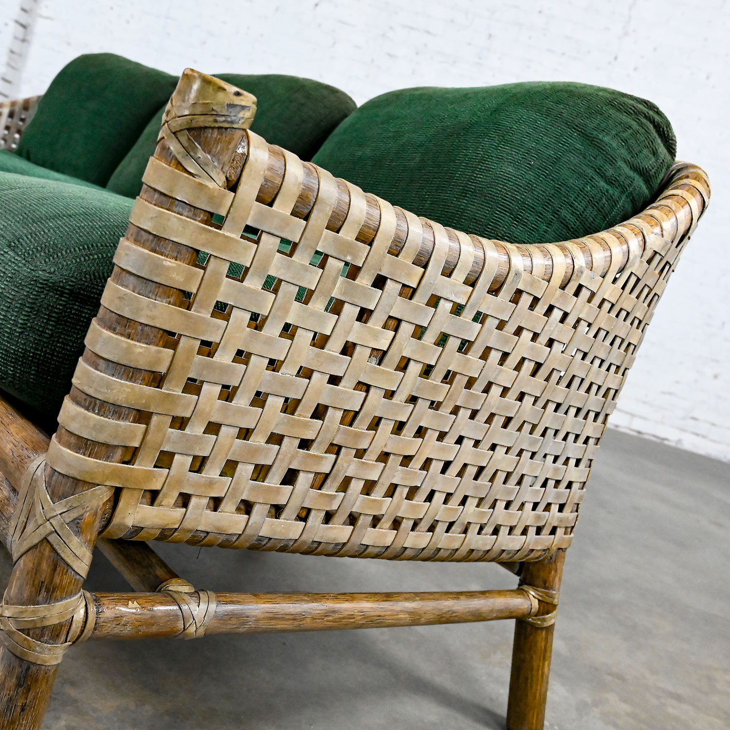 Late 20th Century Modern Rattan & Woven Rawhide Green Chenille Cushion Sofa Settee by McGuire