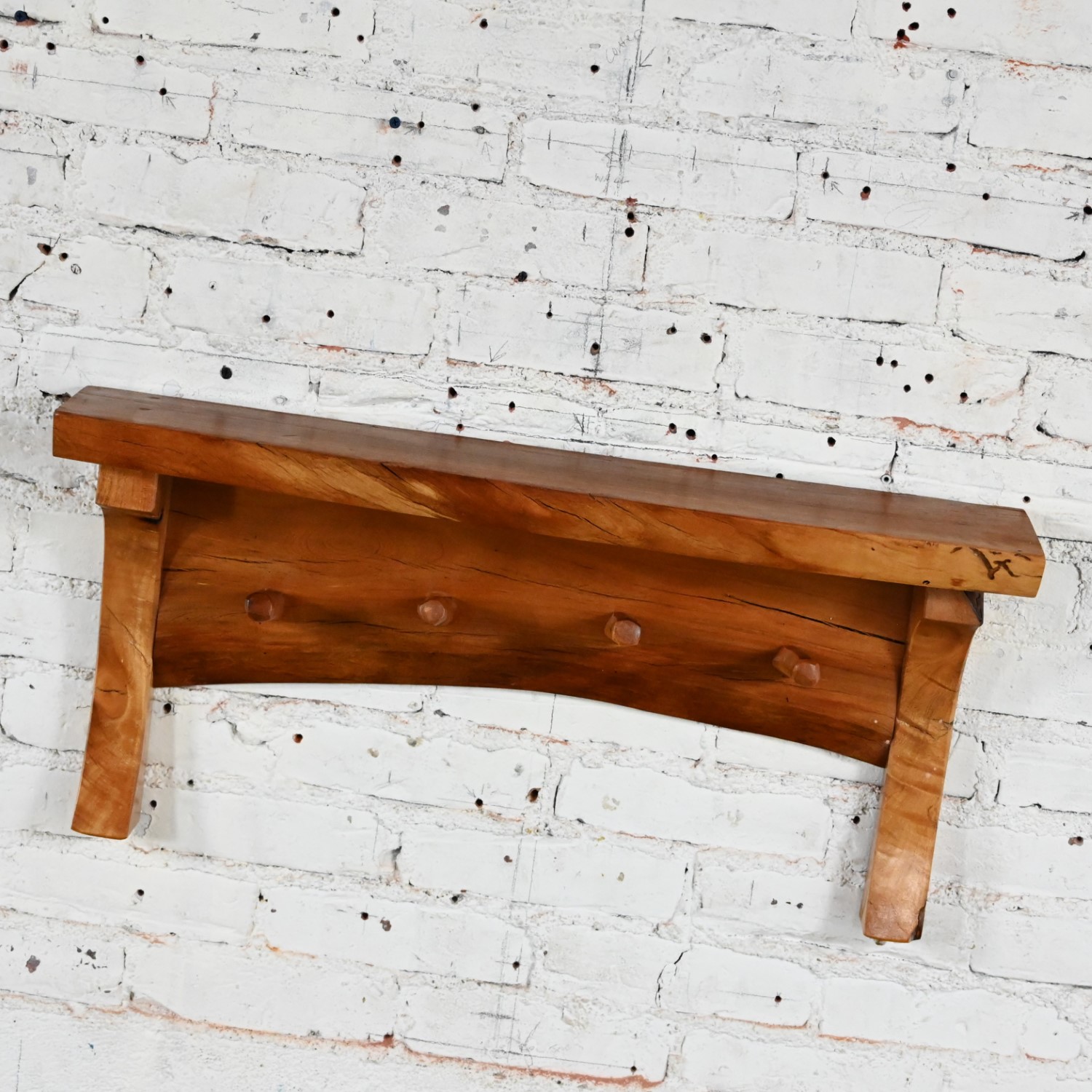 Late 20th Century Folk Art Organic Modern Rustic Natural Edge Wood Slab Wall Shelf with Pegs