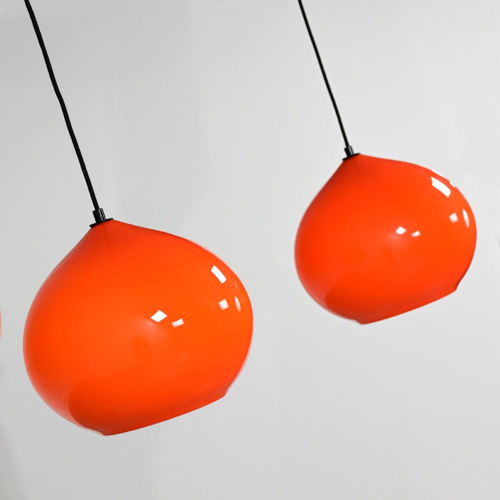 Mid Century Modern Italian Orange Cased Murano Glass Pendant Lights Attributed to Alessandro Pianon for Vistosi