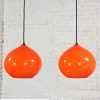 Mid Century Modern Italian Orange Cased Murano Glass Pendant Lights Attributed to Alessandro Pianon for Vistosi