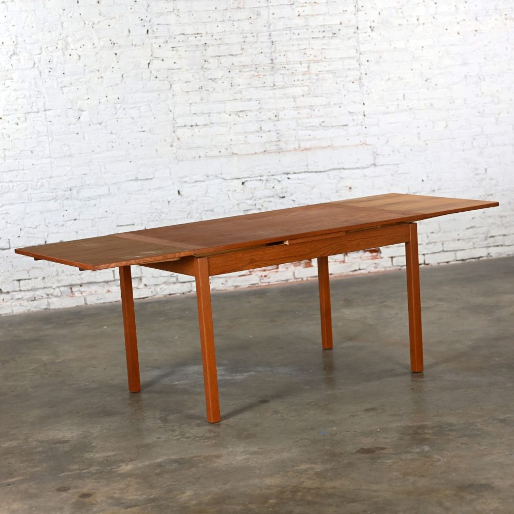 1970’s Scandinavian Modern D Scan Teak Draw Leaf Expanding Dining Table