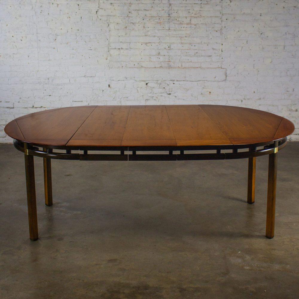 Mid-20th Century MCM to Campaign Style Round to Oval Expanding Dining Table Attributed to Tung Si Collection by Hickory Manufacturing