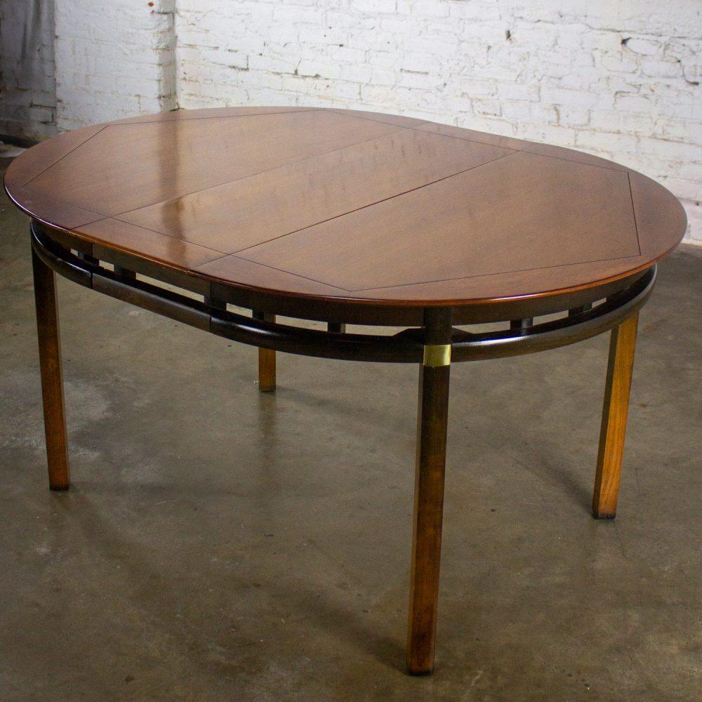 Mid-20th Century MCM to Campaign Style Round to Oval Expanding Dining Table Attributed to Tung Si Collection by Hickory Manufacturing
