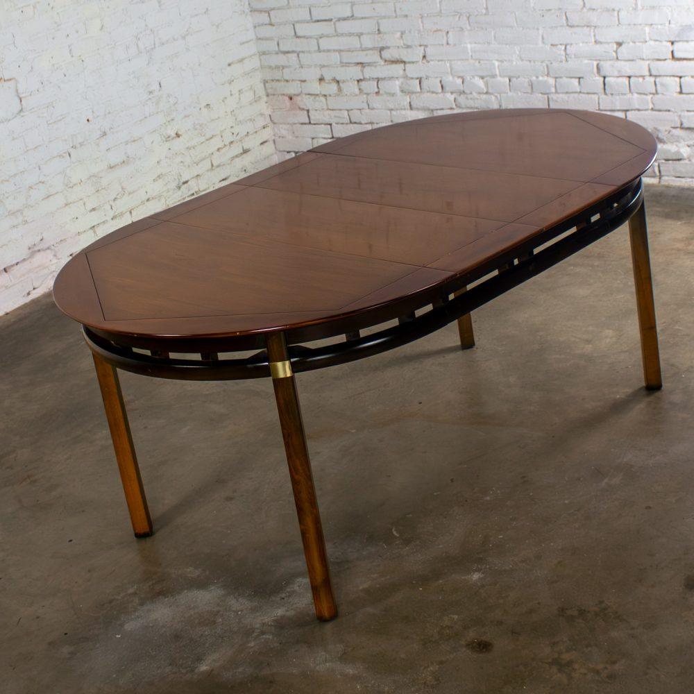 Mid-20th Century MCM to Campaign Style Round to Oval Expanding Dining Table Attributed to Tung Si Collection by Hickory Manufacturing