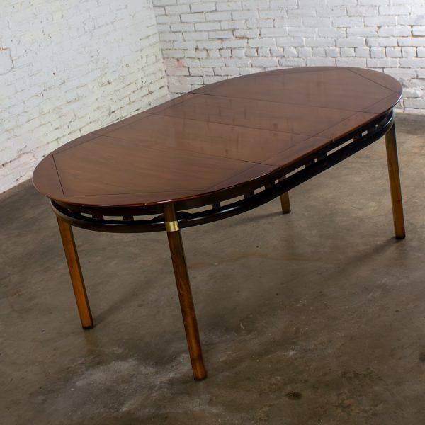 Mid-20th Century MCM to Campaign Style Round to Oval Expanding Dining Table Attributed to Tung Si Collection by Hickory Manufacturing