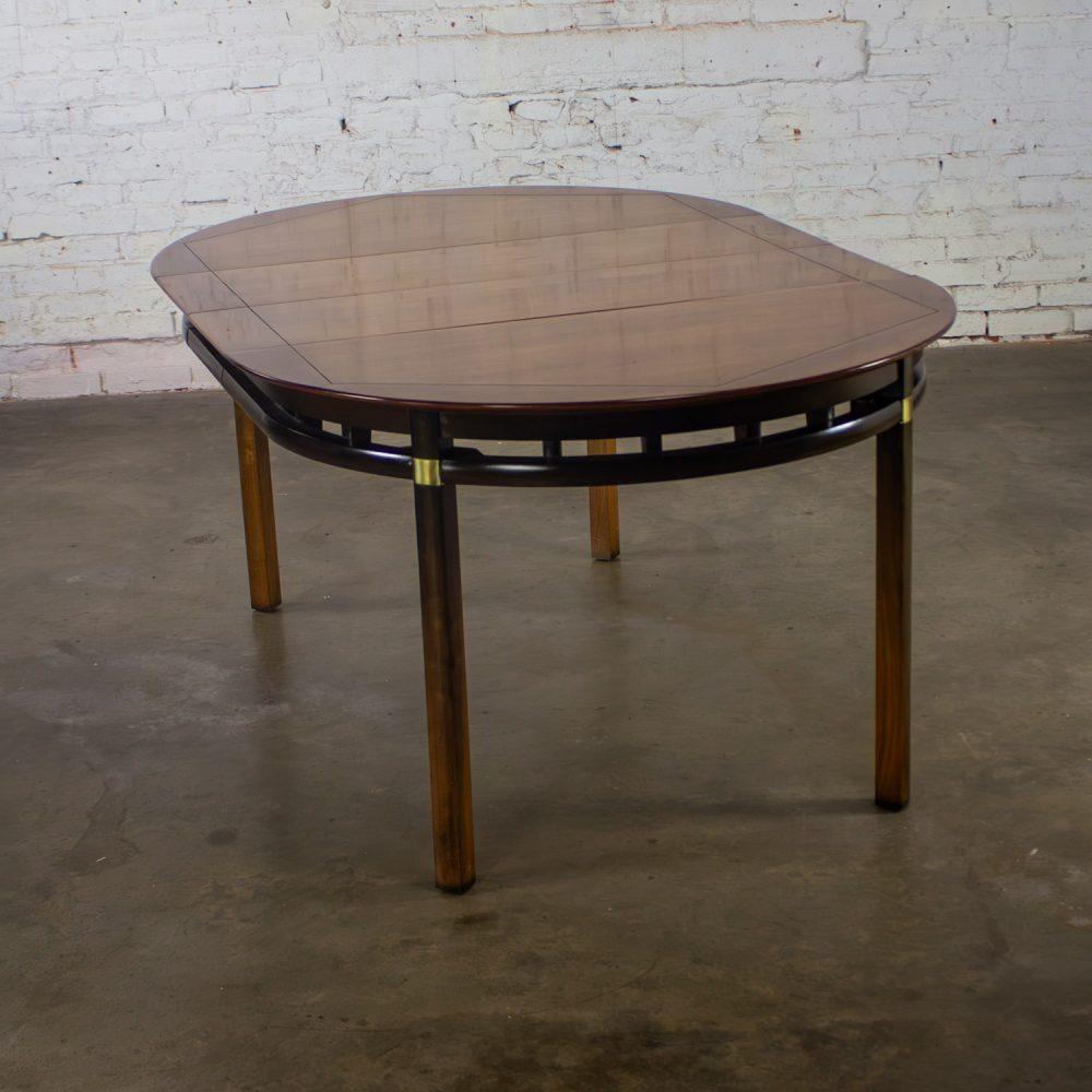 Mid-20th Century MCM to Campaign Style Round to Oval Expanding Dining Table Attributed to Tung Si Collection by Hickory Manufacturing