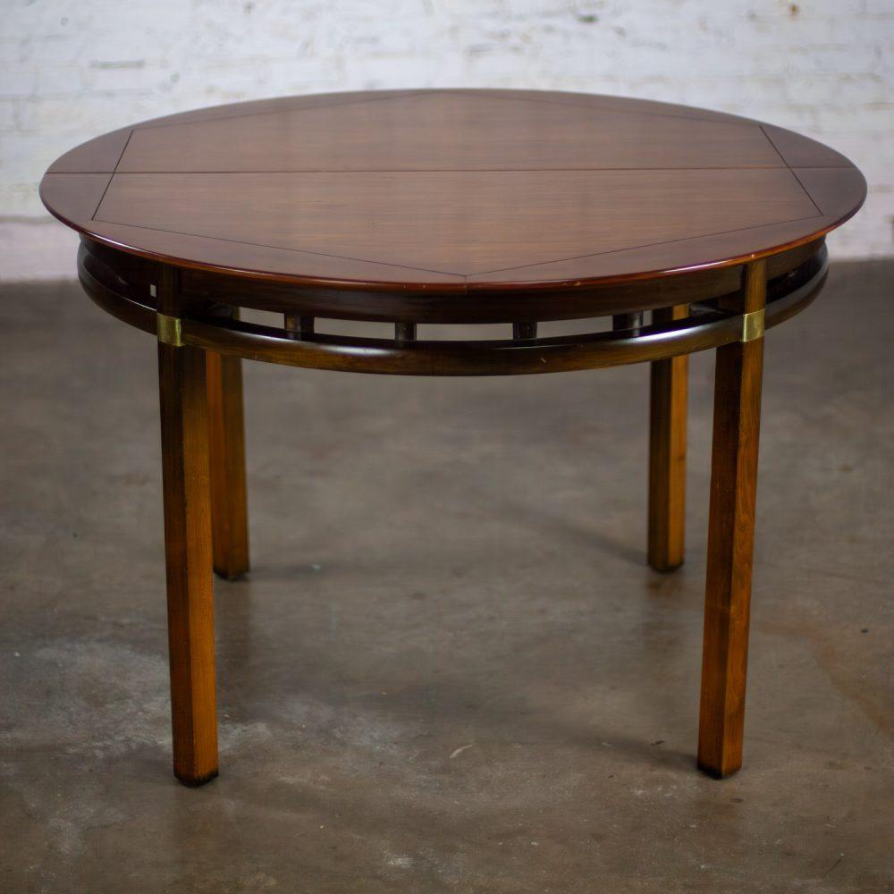 Mid-20th Century MCM to Campaign Style Round to Oval Expanding Dining Table Attributed to Tung Si Collection by Hickory Manufacturing