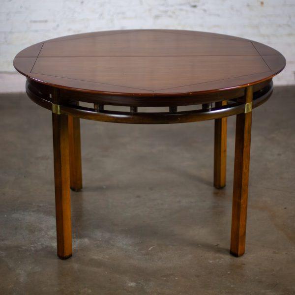 Mid-20th Century MCM to Campaign Style Round to Oval Expanding Dining Table Attributed to Tung Si Collection by Hickory Manufacturing