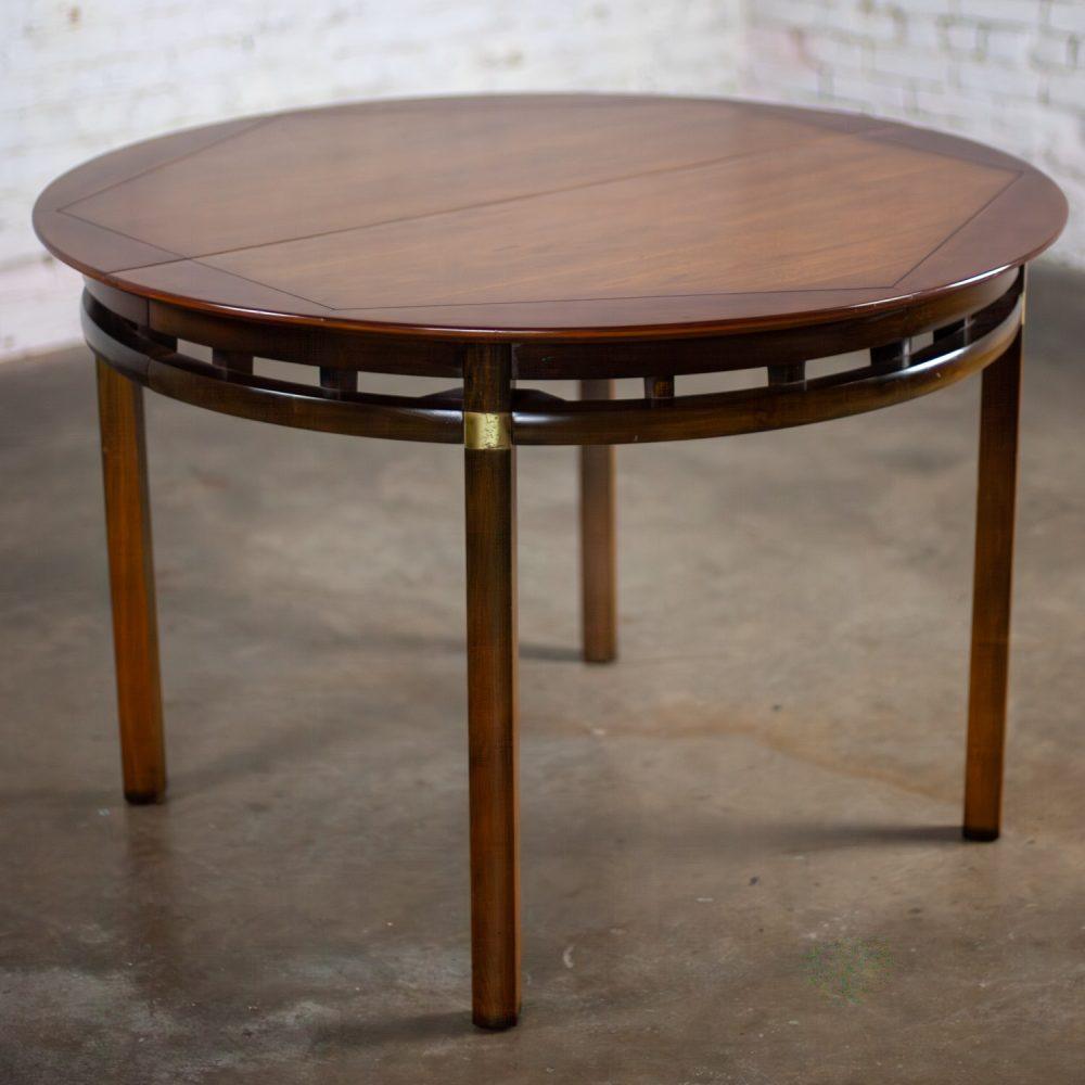Mid-20th Century MCM to Campaign Style Round to Oval Expanding Dining Table Attributed to Tung Si Collection by Hickory Manufacturing