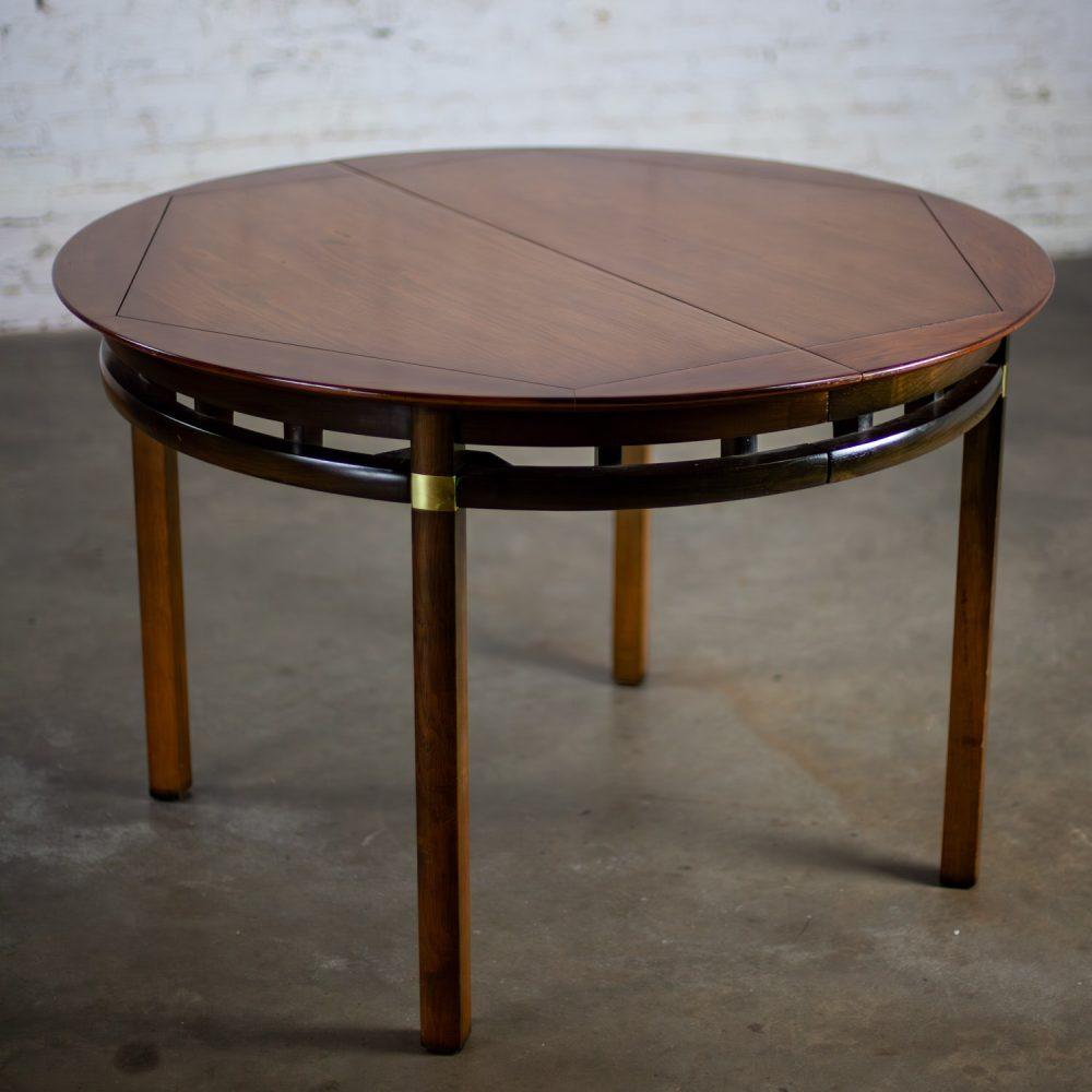 Mid-20th Century MCM to Campaign Style Round to Oval Expanding Dining Table Attributed to Tung Si Collection by Hickory Manufacturing