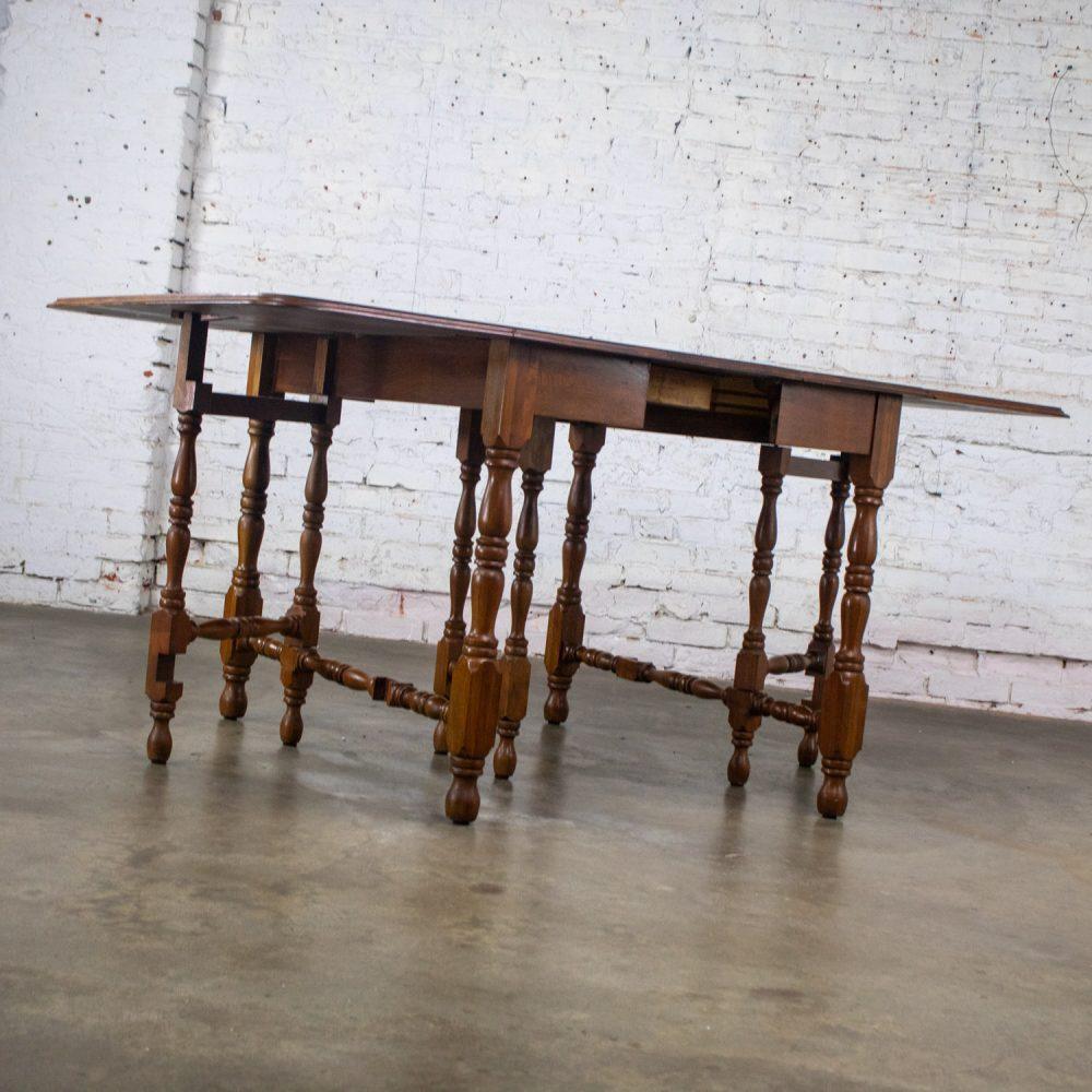 Late 19th to Early 20th Century William & Mary Style Dining Table Walnut Drop Leaf Expanding Gateleg by Abernathy