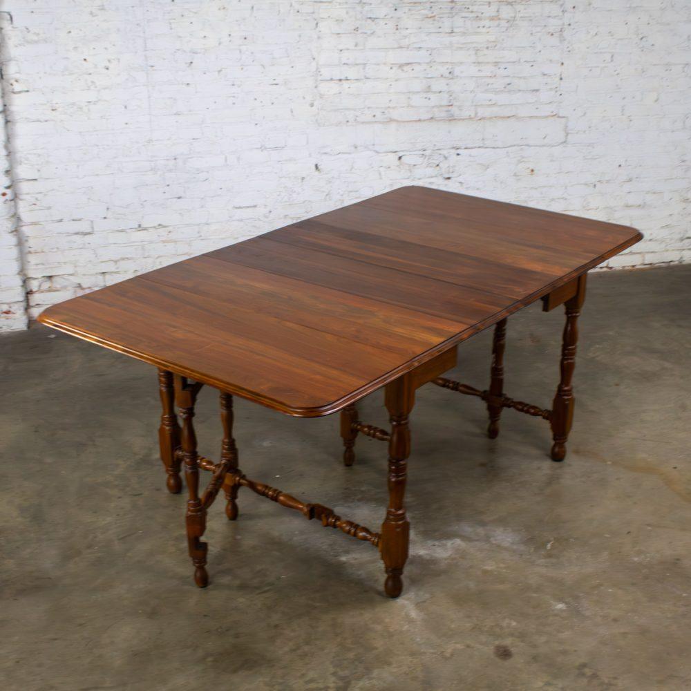 Late 19th to Early 20th Century William & Mary Style Dining Table Walnut Drop Leaf Expanding Gateleg by Abernathy